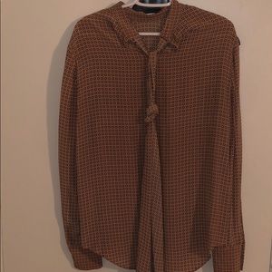 Peachy black and white polka dot shirt